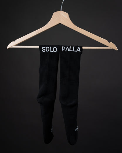 Calze nere Gibi Merch "Solo Palla" con motivo di palline bianche e nere, morbide e comode da indossare.