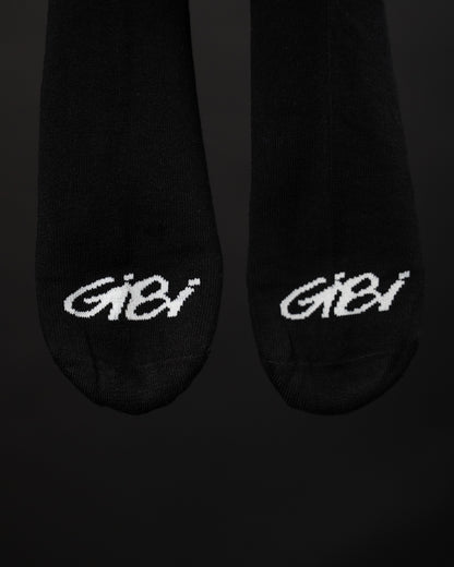 Calze Gibi Merch "Solo Palla" con motivo di palline nere e bianche, morbide e comode da indossare.